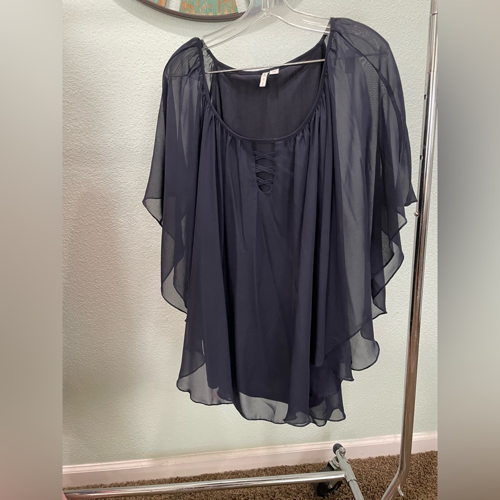 Beautiful blouse with sheer over material
